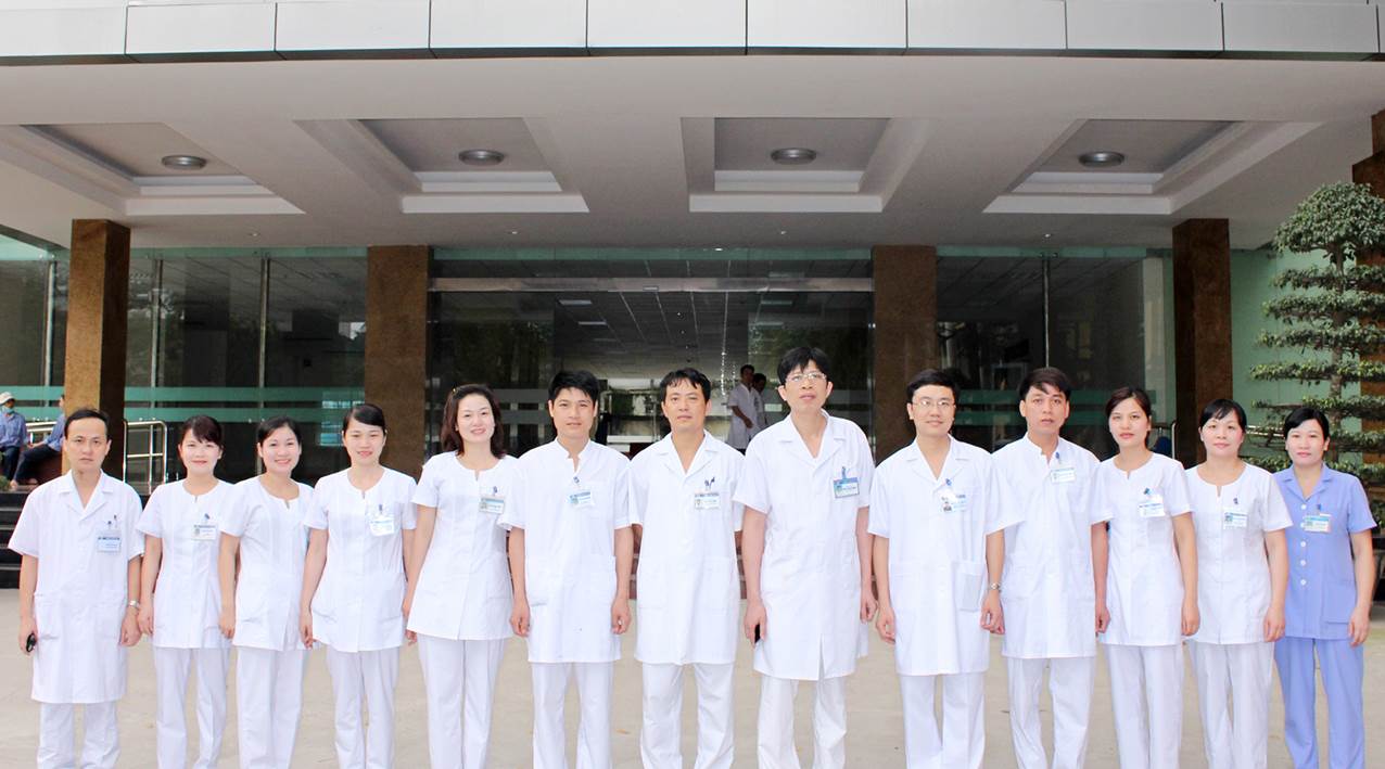 Group of medical staff standing together in a hospital setting
