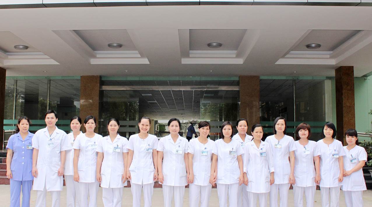 Group of medical staff standing together in a hospital setting