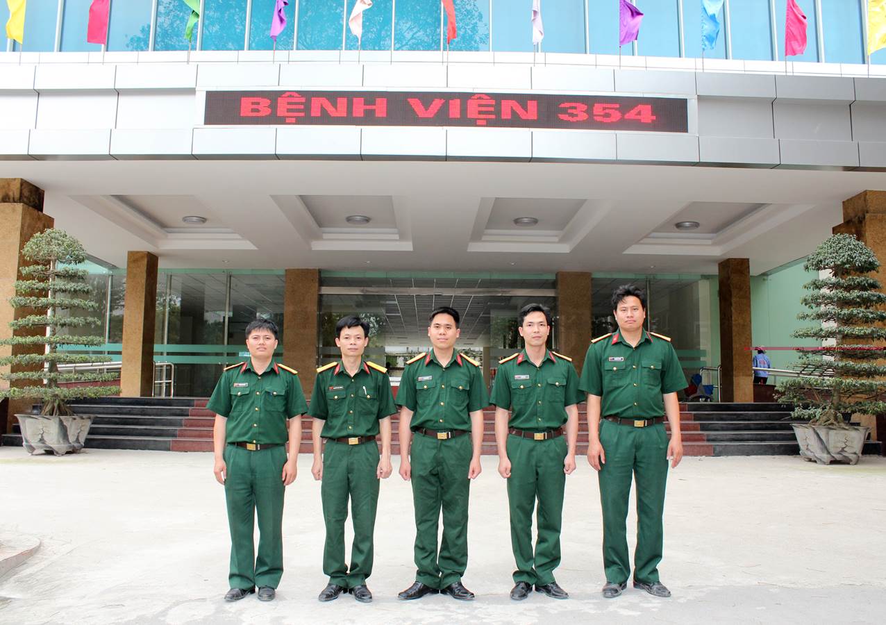 Group of medical staff standing together in a hospital setting
