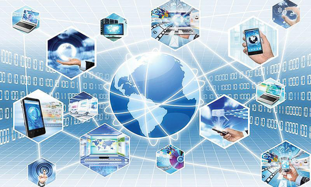 A doctor talking to an elderly patient in a hospital room.