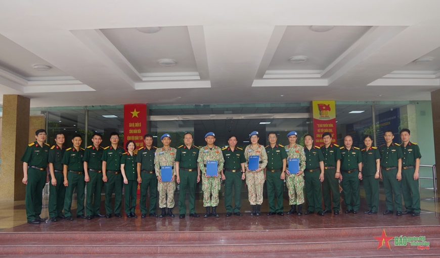 A blood donation event with people donating blood.2